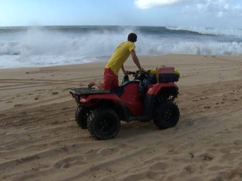 One of the first big winter swells of the season is keeping lifeguards busy — and prompting a...