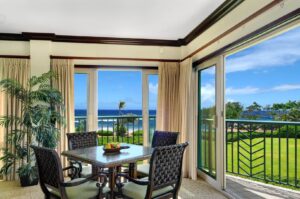 The dining area of a condo rental in Kauai near top attractions on the East Side.
